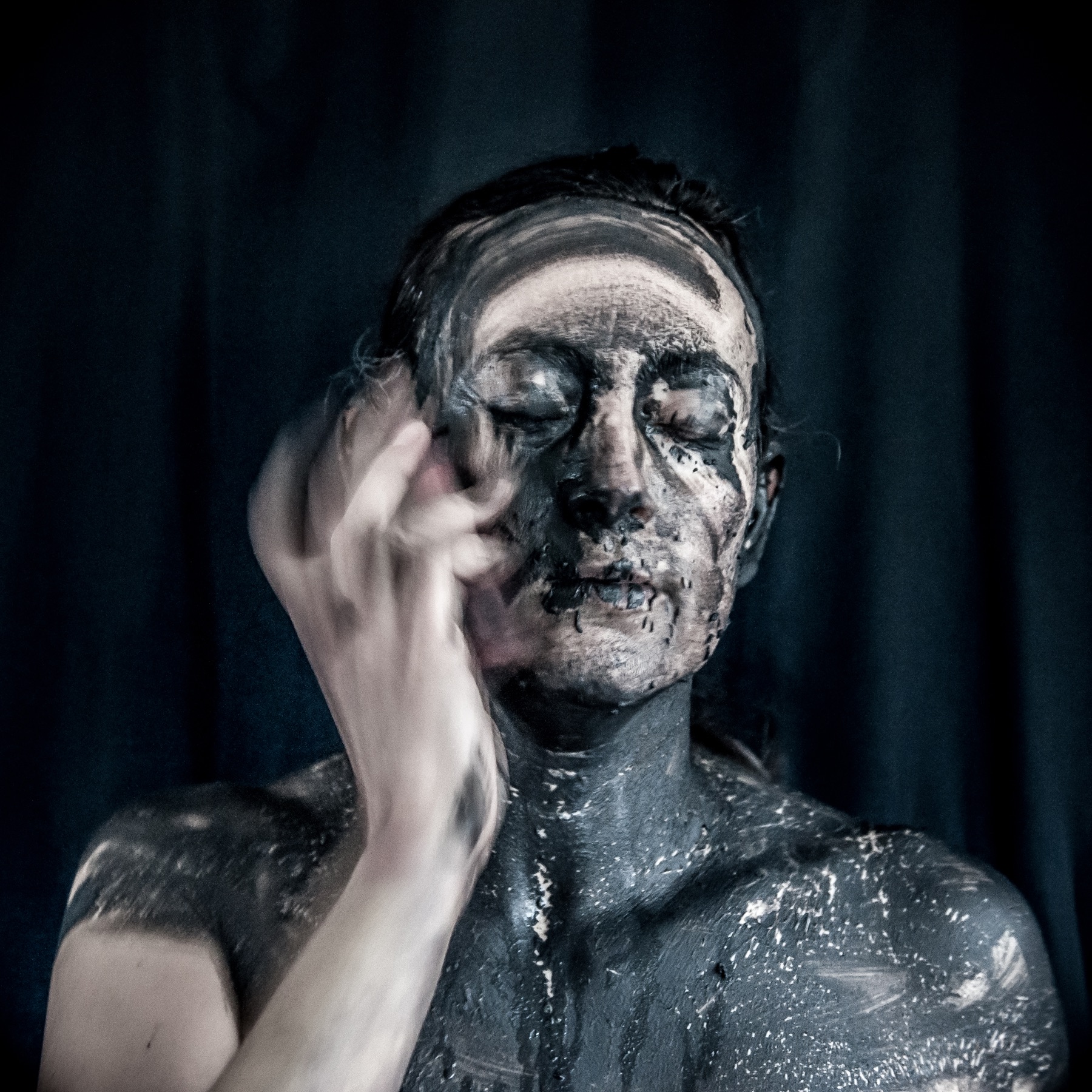 Still from Dis-appear: painted face looking forward