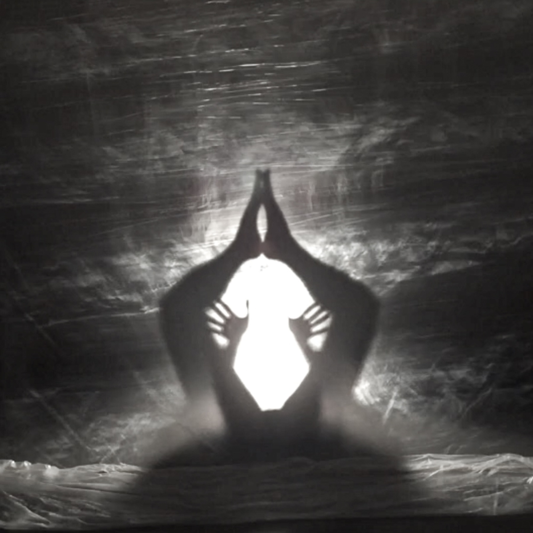 Body framing a central field of light